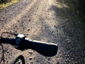 A 13-mile stretch of the bike trail officially opens in 1998, with the 1.6-mile tunnel added in 2001