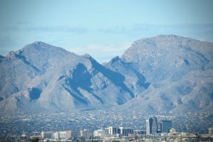 The view 10 miles north to Tucson and the Santa Catalina Mountains from grotto hill at Mission San Xavier del Bac